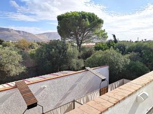 an outdoor swimming pool on top of a house at Domus Amelio - Country Rooms in Cinisi