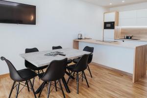 Kuchyň nebo kuchyňský kout v ubytování Apartmány Paľovci