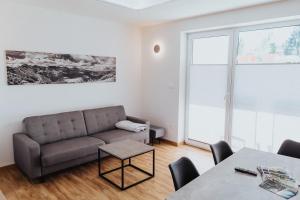 A seating area at Apartmány Paľovci