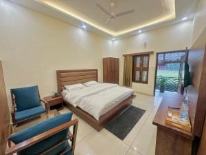 SS Farms Hotel & Resort的休息区