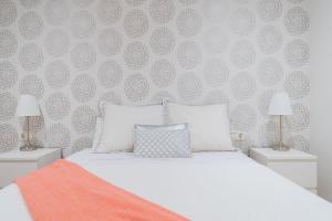 Posteľ alebo postele v izbe v ubytovaní Precioso Apartamento 2 hab. en Malaga Centro