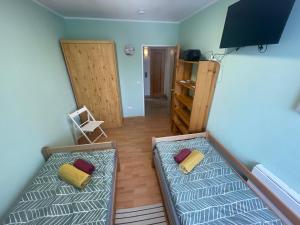 Katil atau katil-katil dalam bilik di Ferienwohnung im Plenter