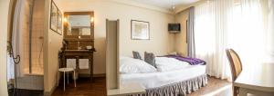 Postel nebo postele na pokoji v ubytování Friedrich von Schiller Hotel