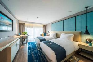 Fotografie z fotogalerie ubytování Echarm Hotel Guiyang Huaxi Branch v destinaci Kuej-jang