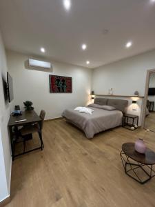 Postel nebo postele na pokoji v ubytování Somnia Luxury Rooms