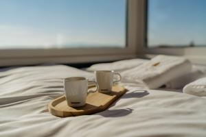 Posteľ alebo postele v izbe v ubytovaní Feelmore Tiny House Eger