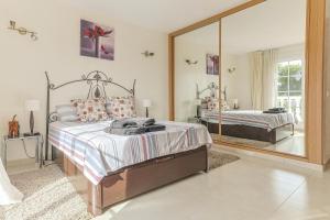 Posteľ alebo postele v izbe v ubytovaní La Casa Blanca