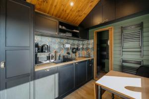 Kuchyňa alebo kuchynka v ubytovaní Feelmore Tiny House Eger