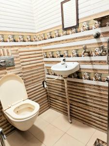 Koupelna v ubytování Hotel Shikhar Inn