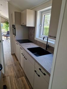 Η κουζίνα ή μικρή κουζίνα στο De Stamper - Chalet 418 +4 φωτογραφίες