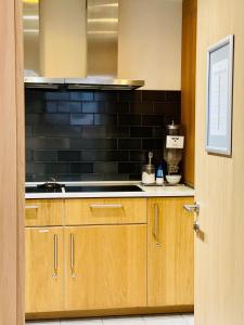 Kuchyňa alebo kuchynka v ubytovaní U-Sense For You Hostel Sevilla
