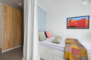 Posteľ alebo postele v izbe v ubytovaní Golden Apartments/Op32