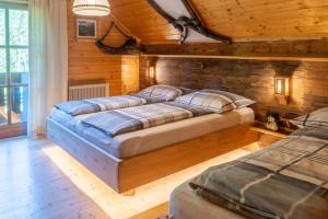 Rúm í herbergi á Gasserhütte
