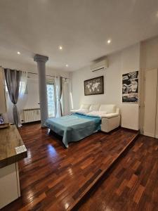 Ένα ή περισσότερα κρεβάτια σε δωμάτιο στο A Casa di Luca