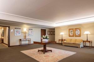 a living room with a couch and a table at Hotel Coia de Vigo in Vigo