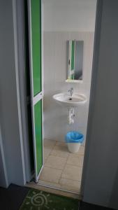 a bathroom with a sink and a toilet at Olive Hotel in Johor Bahru +30 photos
