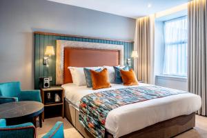 Postel nebo postele na pokoji v ubytování Star Hotel Kingussie