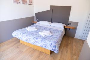Postel nebo postele na pokoji v ubytování Avezzano 3e60