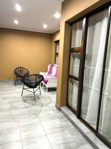 Rehoboth Ezulwini Suites的阳台或露台