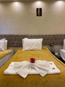 Letto o letti in una camera di PYRAMIDS guest house