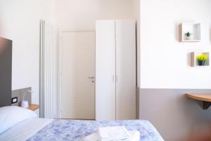 Postel nebo postele na pokoji v ubytování Avezzano 3e60
