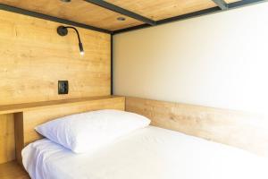 Posteľ alebo postele v izbe v ubytovaní Hostel Petra Marina