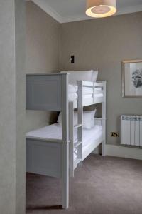 Ένα ή περισσότερα κρεβάτια σε δωμάτιο στο Bruntsfield Hotel +91 φωτογραφίες