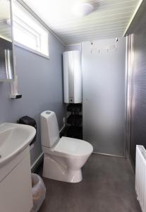 Koupelna v ubytování Evedals Camping Växjö + 10 fotografií