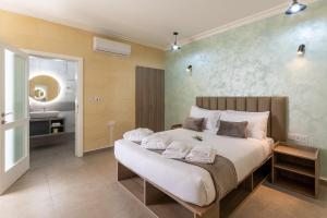 Postel nebo postele na pokoji v ubytování Ta'Battista B&B - Gozo + 37 fotografií