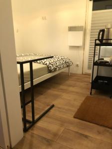 Ένα ή περισσότερα κρεβάτια σε δωμάτιο στο Mini Studio A Bed4U Late Check in