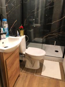 Ένα μπάνιο στο Mini Studio A Bed4U Late Check in