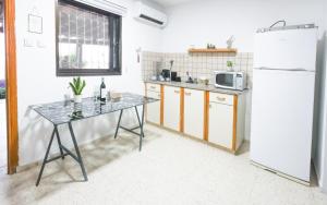 Köök või kööginurk majutusasutuses צימר גל 27 - צימר מקסים עם ג'קוזי מול נוף מדברי מהמם