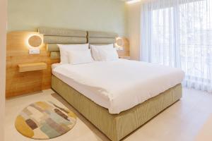 Hotel HOGO客房内的一张或多张床位