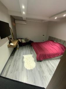 Ένα ή περισσότερα κρεβάτια σε δωμάτιο στο Residence marjane