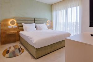 Hotel HOGO客房内的一张或多张床位