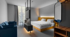 Postel nebo postele na pokoji v ubytování Episode Tbilisi