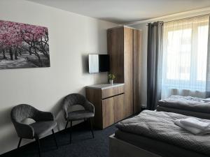 Postel nebo postele na pokoji v ubytování Apartmány Plzeň Zborovská 22 a
