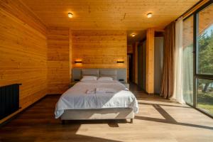 Voodi või voodid majutusasutuse Cottage Tabatskuri toas
