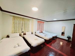 Postel nebo postele na pokoji v ubytování Villa Moa Baguio