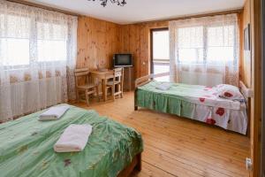 Postel nebo postele na pokoji v ubytování Готель Красія Резорт