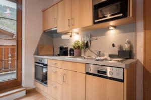 Küche/Küchenzeile in der Unterkunft Apartments SARLO