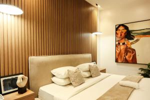 Postel nebo postele na pokoji v ubytování George Residence Cooper Road, Ikoyi