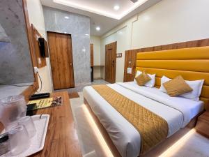 Postel nebo postele na pokoji v ubytování Hotel National - Grant Road