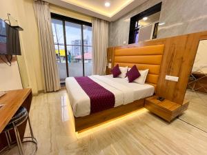 Postel nebo postele na pokoji v ubytování Hotel National - Grant Road