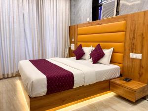 Postel nebo postele na pokoji v ubytování Hotel National - Grant Road