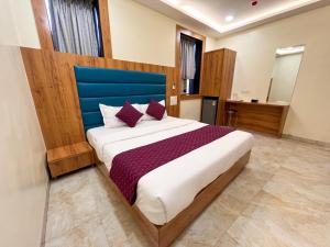 Postel nebo postele na pokoji v ubytování Hotel National - Grant Road