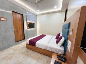 Postel nebo postele na pokoji v ubytování Hotel National - Grant Road