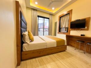 TV a/nebo společenská místnost v ubytování Hotel National - Grant Road