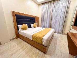 Postel nebo postele na pokoji v ubytování Hotel National - Grant Road