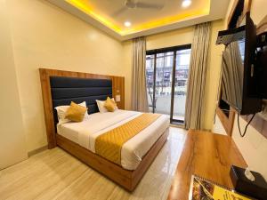TV a/nebo společenská místnost v ubytování Hotel National - Grant Road